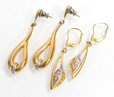 Lot 527 - A pair of yellow metal ear pendants, each set...