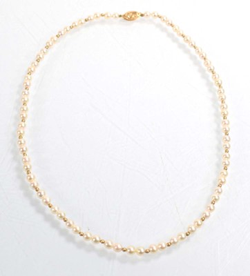 Lot 530 - A single strand cultured pearl necklace with...