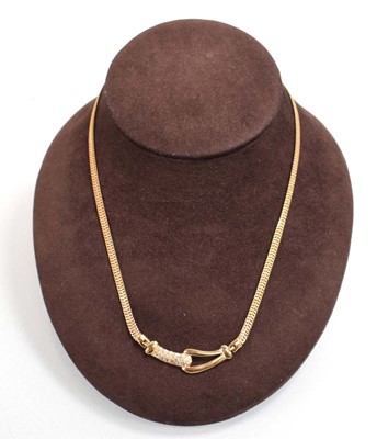 Lot 532 - A 9ct yellow gold double flat curblink...