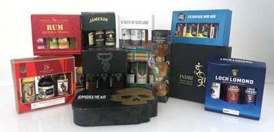 Lot 26 - 12 Whisky / Rum Gift Sets of miniatures by...