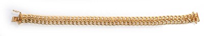 Lot 537 - A 9ct yellow gold double curblink bracelet, l....