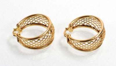 Lot 542 - A pair of 9ct yellow gold ear hoops of trellis...