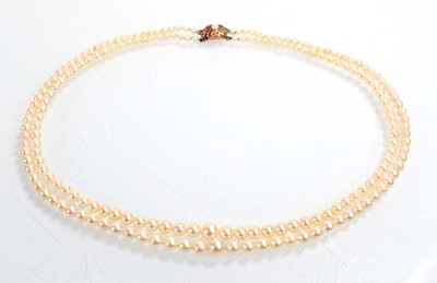 Lot 546 - A double strand graduated cultured pearl...