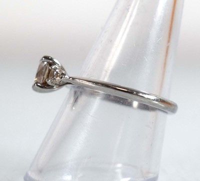 Lot 547 - A platinum ring set brilliant cut lab grown...