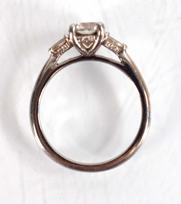 Lot 547 - A platinum ring set brilliant cut lab grown...