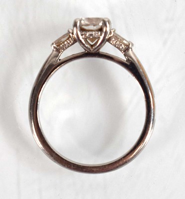 Lot 547 - A platinum ring set brilliant cut lab grown...