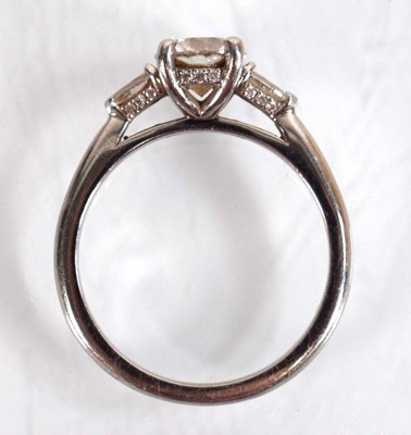 Lot 547 - A platinum ring set brilliant cut lab grown...