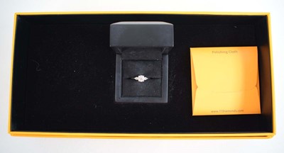 Lot 547 - A platinum ring set brilliant cut lab grown...