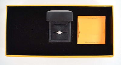 Lot 547 - A platinum ring set brilliant cut lab grown...