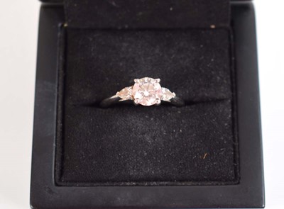 Lot 547 - A platinum ring set brilliant cut lab grown...