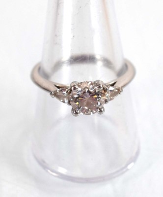 Lot 547 - A platinum ring set brilliant cut lab grown...