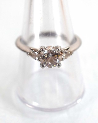 Lot 547 - A platinum ring set brilliant cut lab grown...