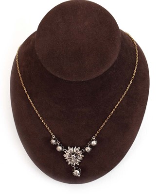 Lot 548 - An early 20th century 9ct yellow gold...