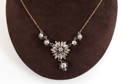 Lot 548 - An early 20th century 9ct yellow gold...