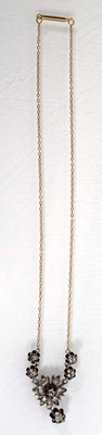 Lot 548 - An early 20th century 9ct yellow gold...