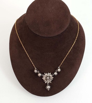 Lot 548 - An early 20th century 9ct yellow gold...