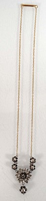 Lot 548 - An early 20th century 9ct yellow gold...