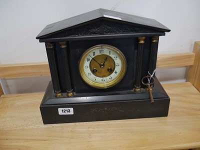 Lot 1213 - Small slate cased mantel clock with key