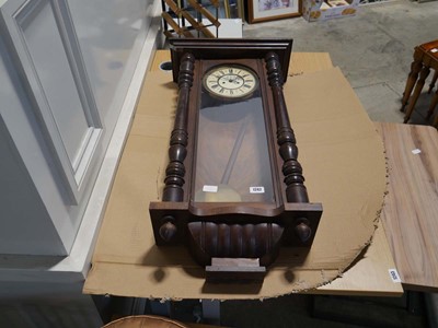 Lot 1242 - Wooden cased pendulum wall clock in the Vienna...