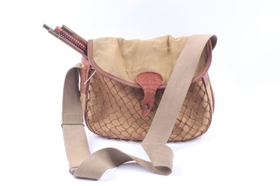 Lot 1018 - Canvas and leather game bag with webbing...