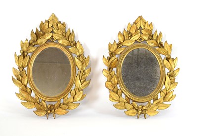 Lot 5 - A pair of 19th century wall mirrors, the oval...