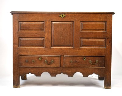 Lot 7 - A Georgian oak mule chest, the lift lid...