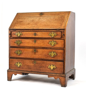 Lot 8 - A Georgian oak bureau, the fall-front...