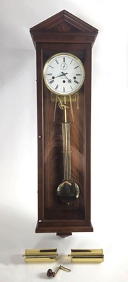 Lot 24 - A Comitti of London wall clock, the enamelled...