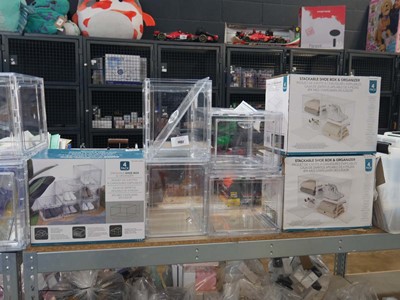 Lot 1407 - Quantity of boxed and unboxed stackable shoe...