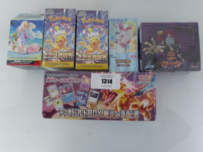 Lot Assortment of sealed Pokémon products to...