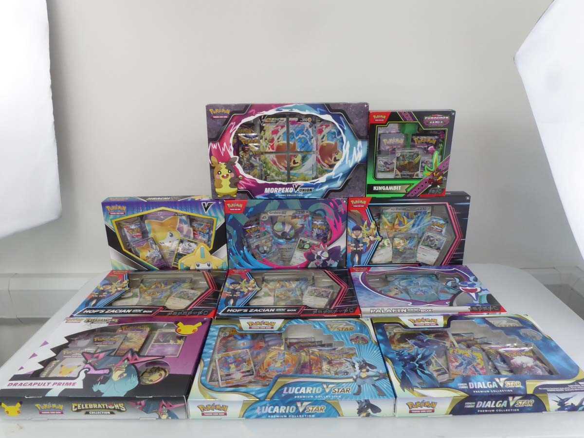 Lot 11 assorted Pokémon collection boxes, to...