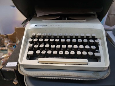 Lot 1418 - 2 portable typewriters in cases