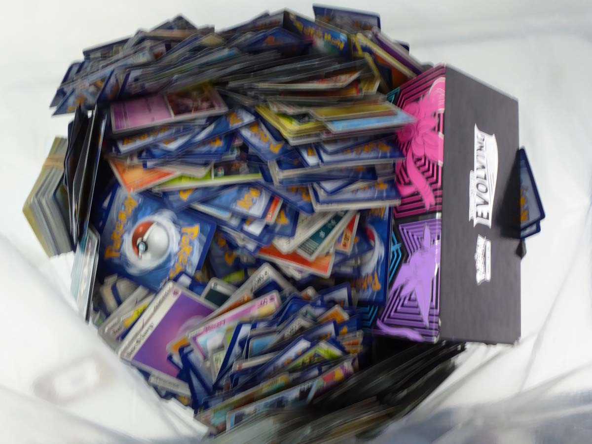 Lot Bag containing a large qty of assorted Pokémon...