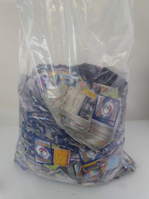 Lot Bag containing a large qty of assorted Pokémon...