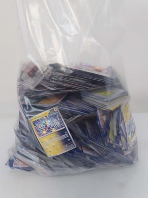 Lot Bag containing qty of Pokémon and other...