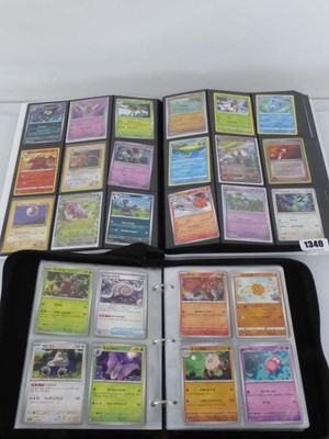 Lot 2 Pokémon binders containing a qty of assorted...