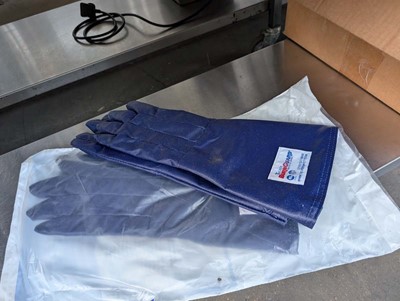 Lot 334 - Large box containing Tucker burnguard heavy...