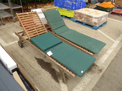 Lot 4141 - 2 slatted timber garden sun loungers with...