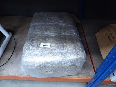Lot 4082 - A pack containing a quantity of hay