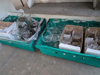 Lot 502 - 4 plastic crates of assorted glassware,...