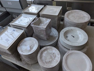 Lot 509 - Half a table top with assorted white crockery,...