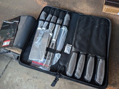Lot 574 - 9 piece Samurai Japanese style knife set in...