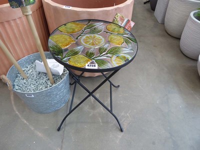 Lot 4256 - Small glass topped folding garden coffee table...
