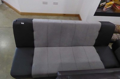 Lot 5049 - Grey fabric and leather effect sofa bed
