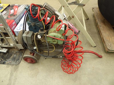 Lot 4402 - 240V air compressor with hose and attachments...