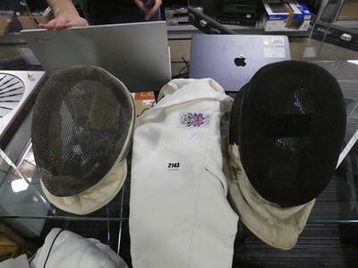 Lot 2143 - 2 fencing masks and fencing clothing