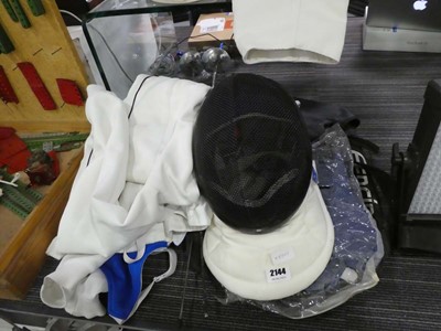 Lot 2144 - Selection of fencing masks, fencing swords,...