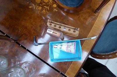 Lot 5153 - Shoehorn, pipe rack, wooden moneybox, and...