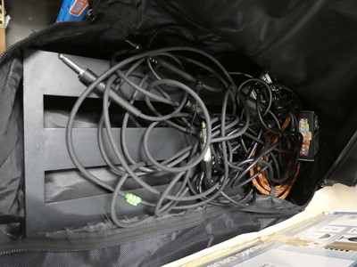 Lot 2283 - Bag of guitar pedal board and other guitar...