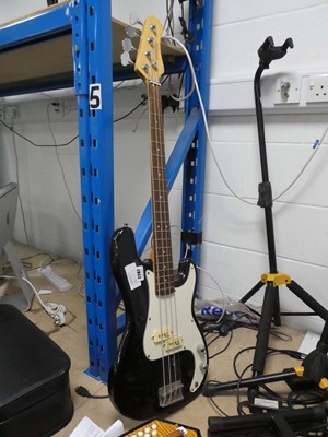 Lot 2287 - Stagg 4 string electric bass guitar in white...